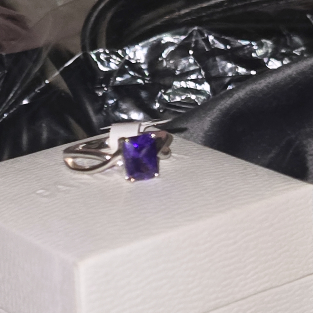 Elegant Silver Ring with Deep Purple Stone